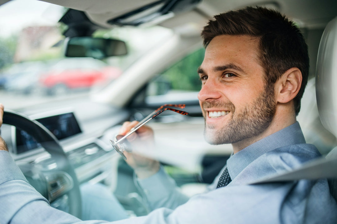 man inside car